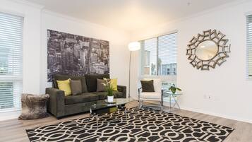 Exclusive Apartment, Multiple Beds, Non Smoking | Living room | TV