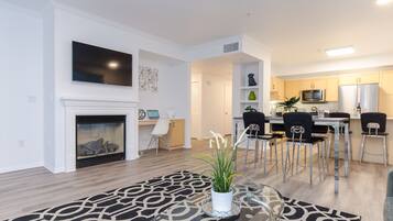Exclusive Apartment, Multiple Beds, Non Smoking | Living area | TV