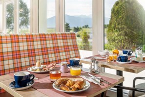 Daily buffet breakfast (EUR 15 per person)