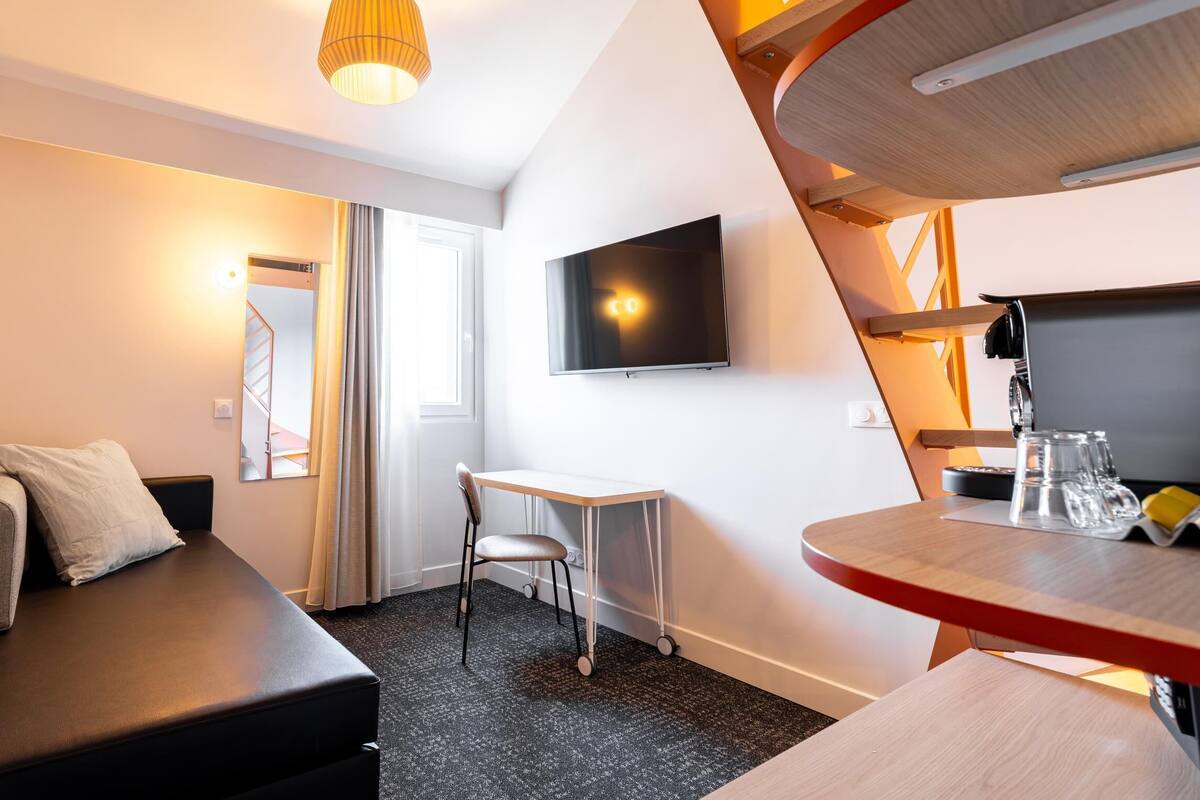 Premium bedding, memory foam beds, laptop workspace, soundproofing