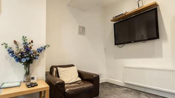 TV, DVD player, video library