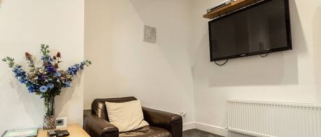 TV, DVD player, video library