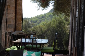 Outdoor dining - Beautifully modernised Old Stone House with amazing views and infinity pool (Zacharo)