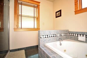 Combined shower/tub, hair dryer, towels, soap