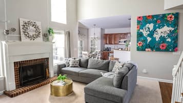 Smart TV, fireplace, books, offices