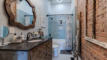 Combined shower/bathtub, hair dryer, towels, soap