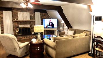 Smart TV, fireplace, DVD player, books