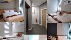 Una habitación de hotel con cama, escritorio, silla, televisor y baño con inodoro y lavamanos.
