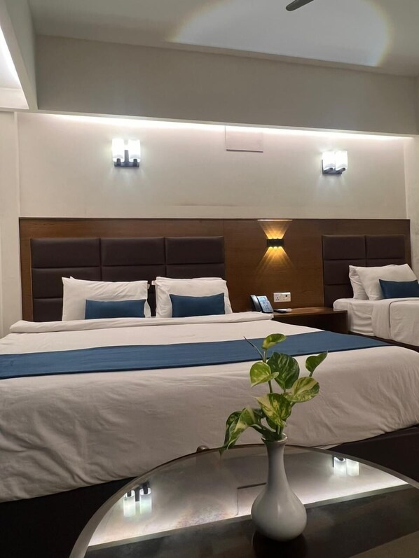 Standard Triple Room, Multiple Beds, City View | Premium bedding, desk, laptop workspace, blackout curtains - Hotel Kollol By J & Z Group (Cox's Bazar)