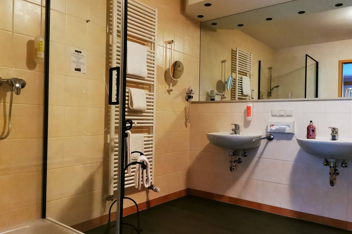 junior suite | bathroom | hair dryer, towels, soap, shampoo