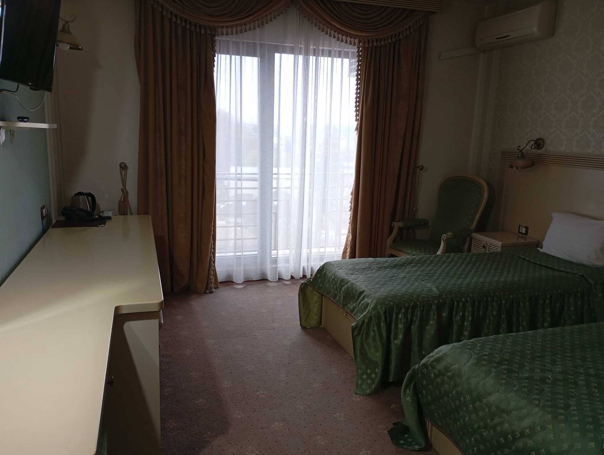 Deluxe-Dreibettzimmer | Zimmersafe, individuell dekoriert, individuell eingerichtet