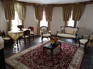 Suite, 1 Queen Bed | In-room safe, individually decorated, individually furnished, desk - Excalibur Boutique Hotel (Rustenburg)