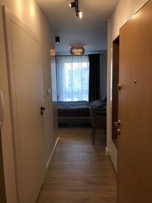 Deluxe Apartment (4) | Living area | 49-inch flat-screen TV with cable channels, TV, Netflix - Like at Home Warsaw (Warsaw)