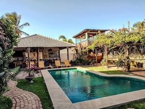 Outdoor pool, open 10:00 AM to 10:00 PM, pool loungers
