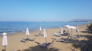 On the beach, white sand, beach umbrellas