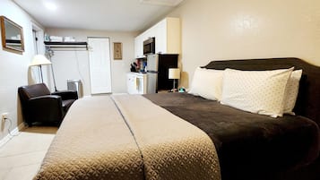 1 bedroom, desk, iron/ironing board, travel cot