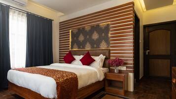 Chambre Double Confort, vue jardin | Draps en coton égyptien, literie de qualité supérieure