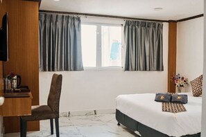 Coffres-forts dans les chambres, Wi-Fi gratuit, draps fournis