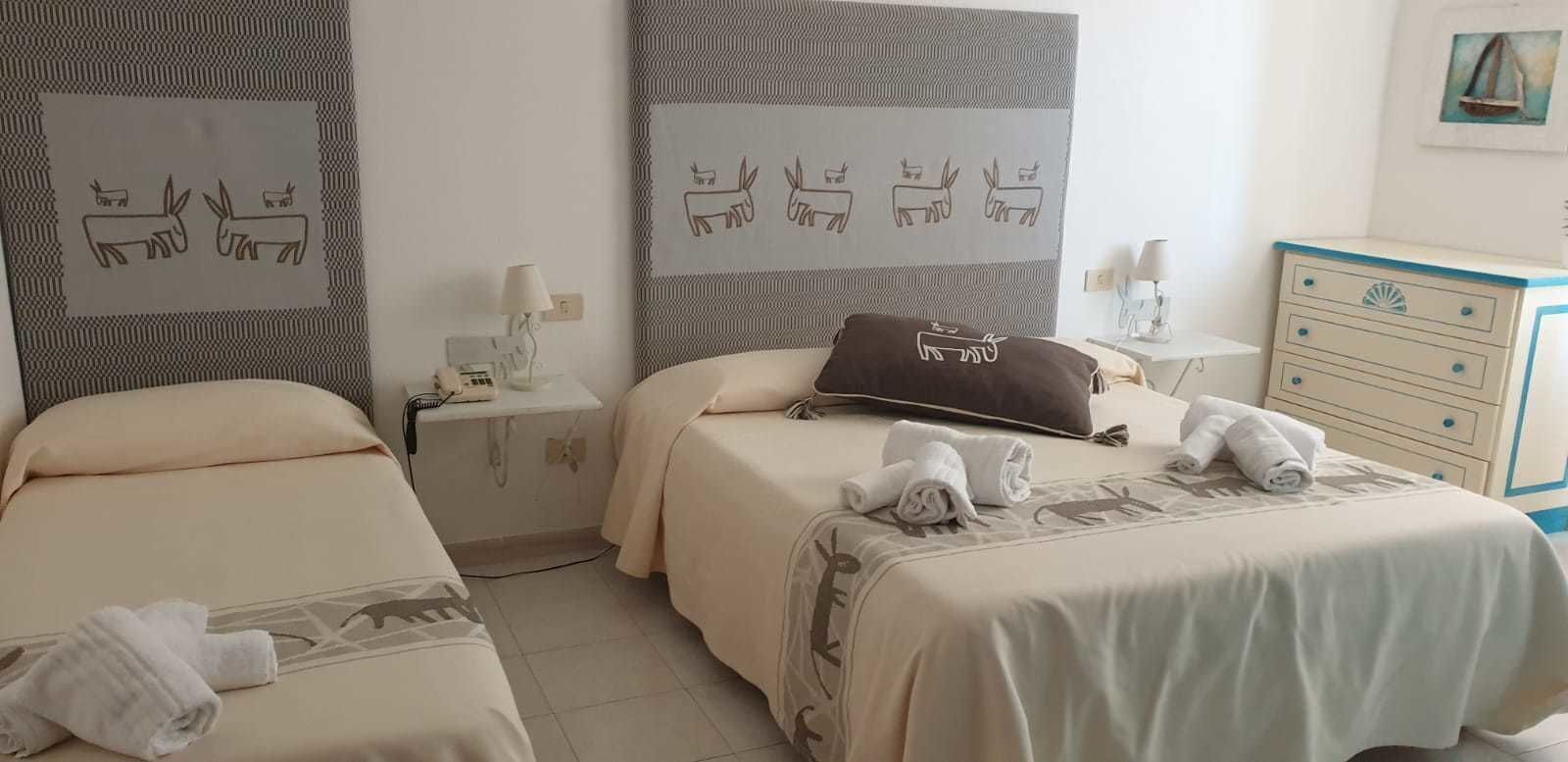 Frigobar, Wi-Fi de cortesia, roupa de cama