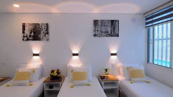 Standard Triple Room | Minibar, in-room safe, soundproofing, free WiFi