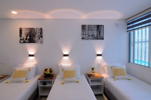 Standard Triple Room | Minibar, in-room safe, soundproofing, free WiFi