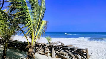 Private beach, free beach cabanas, beach umbrellas, beach massages