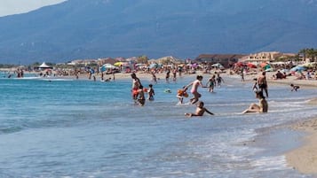 On the beach, sun loungers