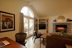 Smart TV, fireplace, foosball, books