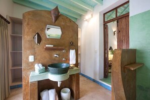 Bathtub, hair dryer, towels