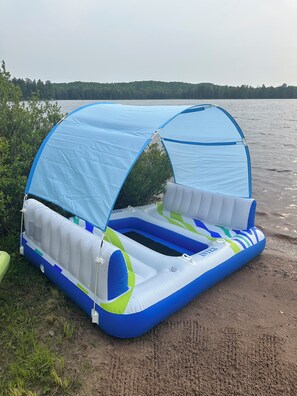 On the beach, sun-loungers