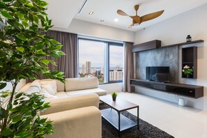 Premium Apartment, 2 Bedrooms, Sea View | Living area | 40-inch LED TV with digital channels - Tropicana 218 Macalister (George Town)