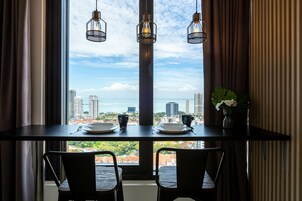 Suíte estúdio exclusiva, vista para o mar | Individualmente decorados, individualmente mobiliados, cortinas blackout