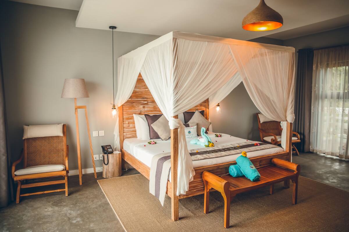 Junior Chalet, Ocean View | 1 bedroom, premium bedding, minibar, in-room safe