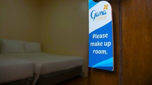 A sign in a room at Gana Siargao Island Resort instructing to make up the room. - Gana Siargao Island Resort (General Luna)