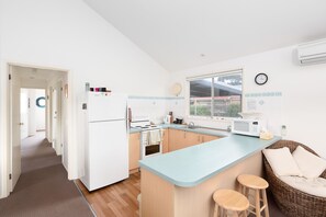 Fridge, microwave, cookware/dishes/utensils