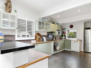 Fridge, microwave, toaster, cookware/dishes/utensils