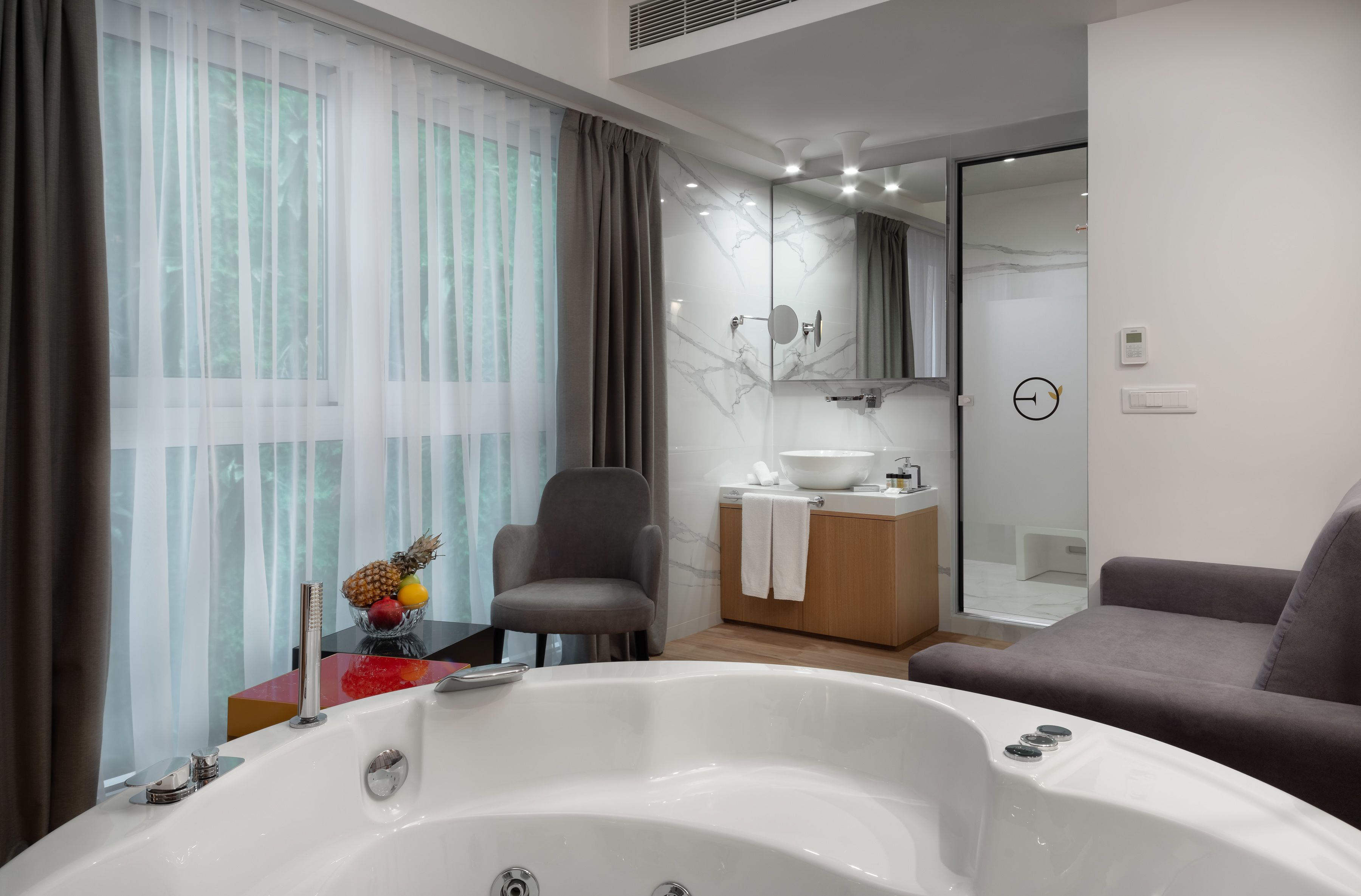 junior suite, jetted tub | premium bedding, minibar, in-room safe, individually decorated