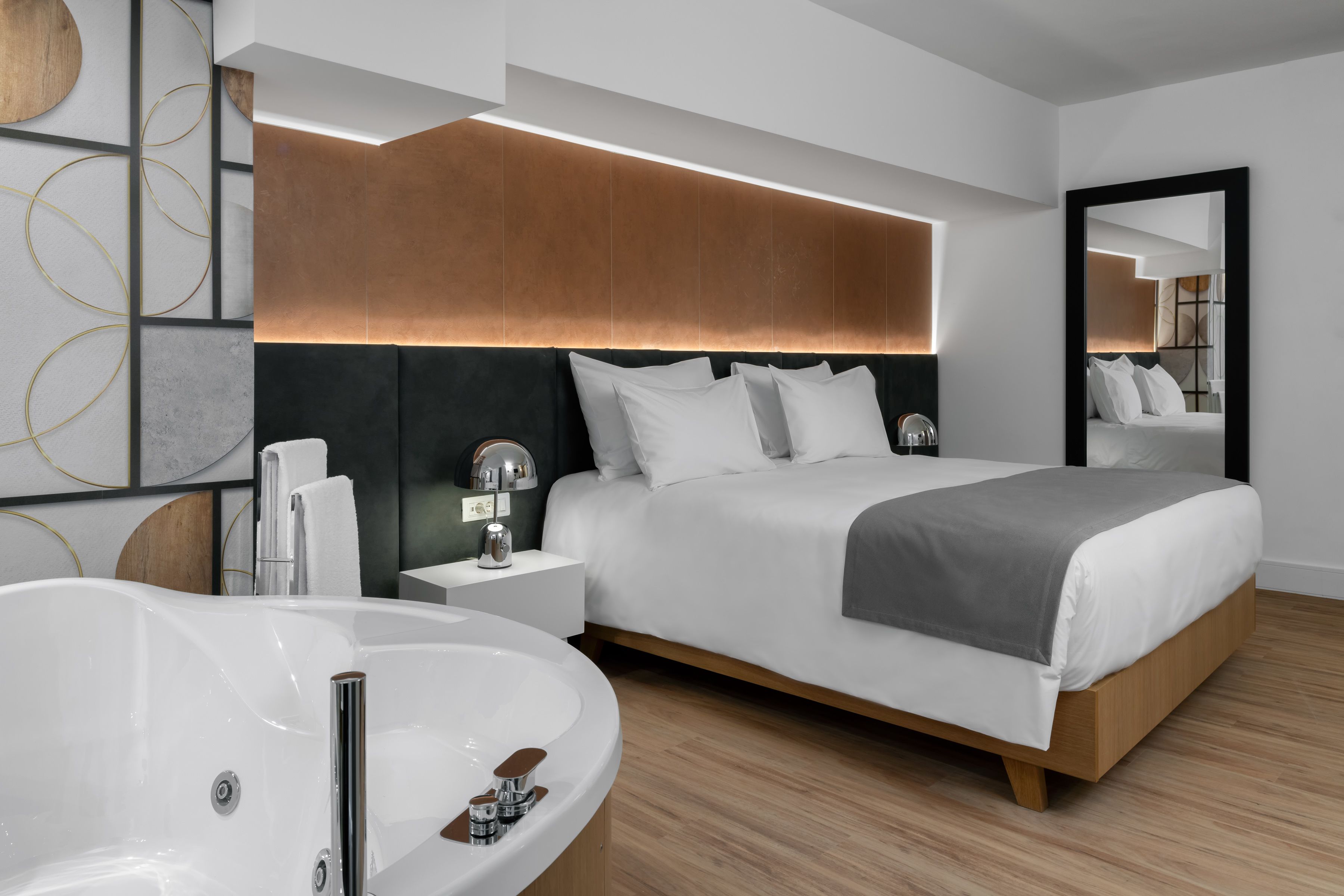 junior suite, jetted tub | premium bedding, minibar, in-room safe, individually decorated