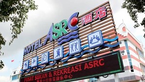 A hotel sign with ASRC, indicating it is a hotel.