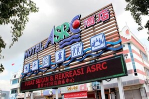 A hotel sign with ASRC, indicating it is a hotel.