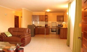 Family Room | Living area | 32-inch LCD TV with satellite channels, TV - LIA Hotel & Training Centre (Nairobi)