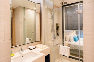 Shower, free toiletries, hair dryer, slippers