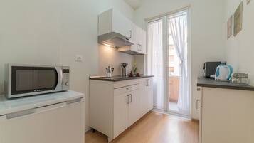 Apartment, 2 Bedrooms | Private kitchen | Fridge, microwave, stovetop, espresso maker