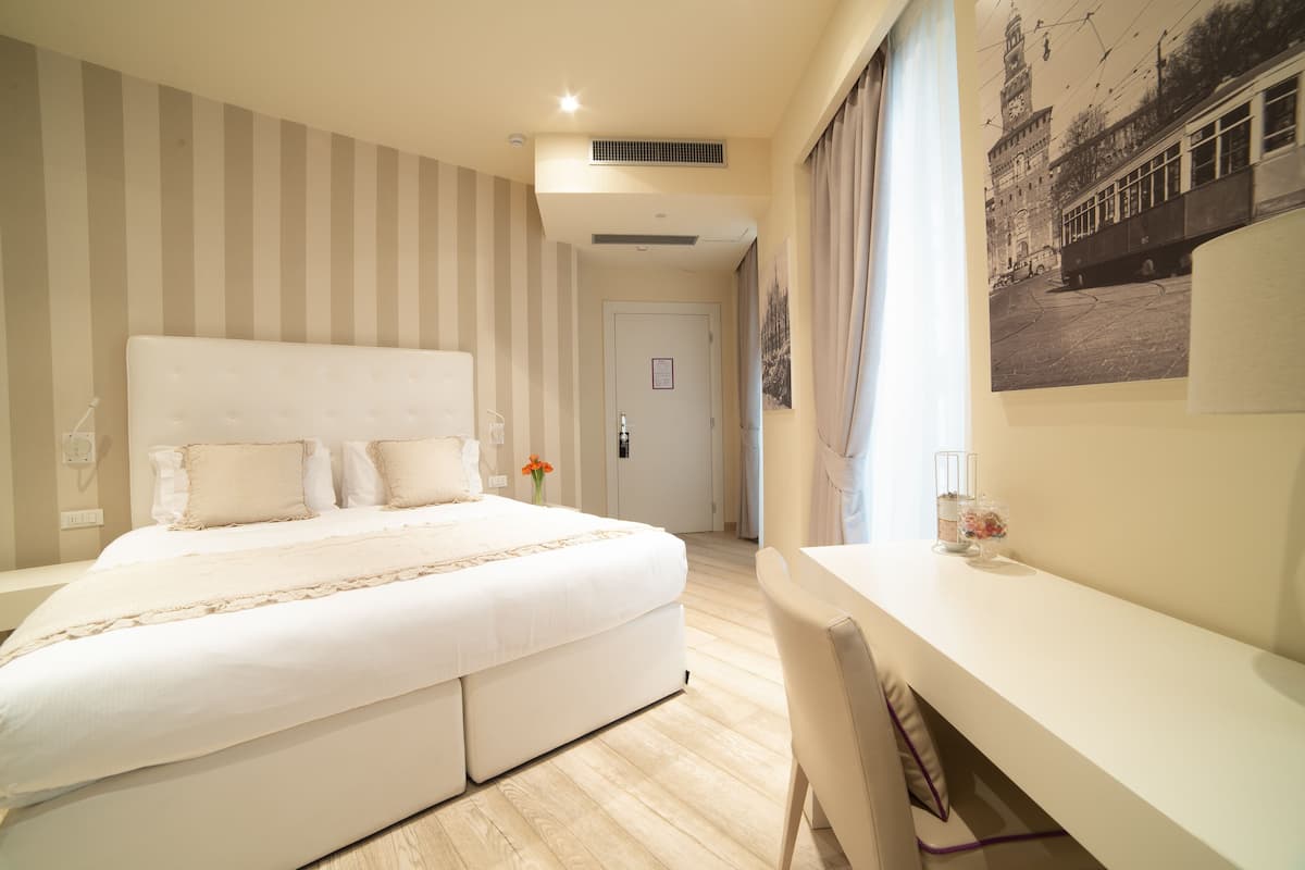 Premium bedding, down duvets, minibar, in-room safe