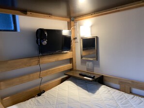 Bedden met traagschuimmatras, een kluis op de kamer