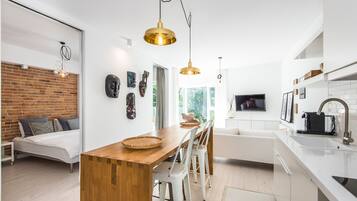 Design Apartment (Exotic) | Living area | Flat-screen TV