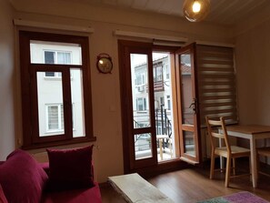 Penthouse, 1 Double Bed with Sofa bed, Non Smoking, City View | Living area | 42-inch flat-screen TV with cable channels, LED TV, streaming services