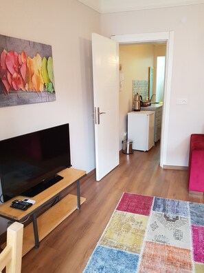 Penthouse, 1 Double Bed with Sofa bed, Non Smoking, City View | Living area | 42-inch flat-screen TV with cable channels, LED TV, streaming services