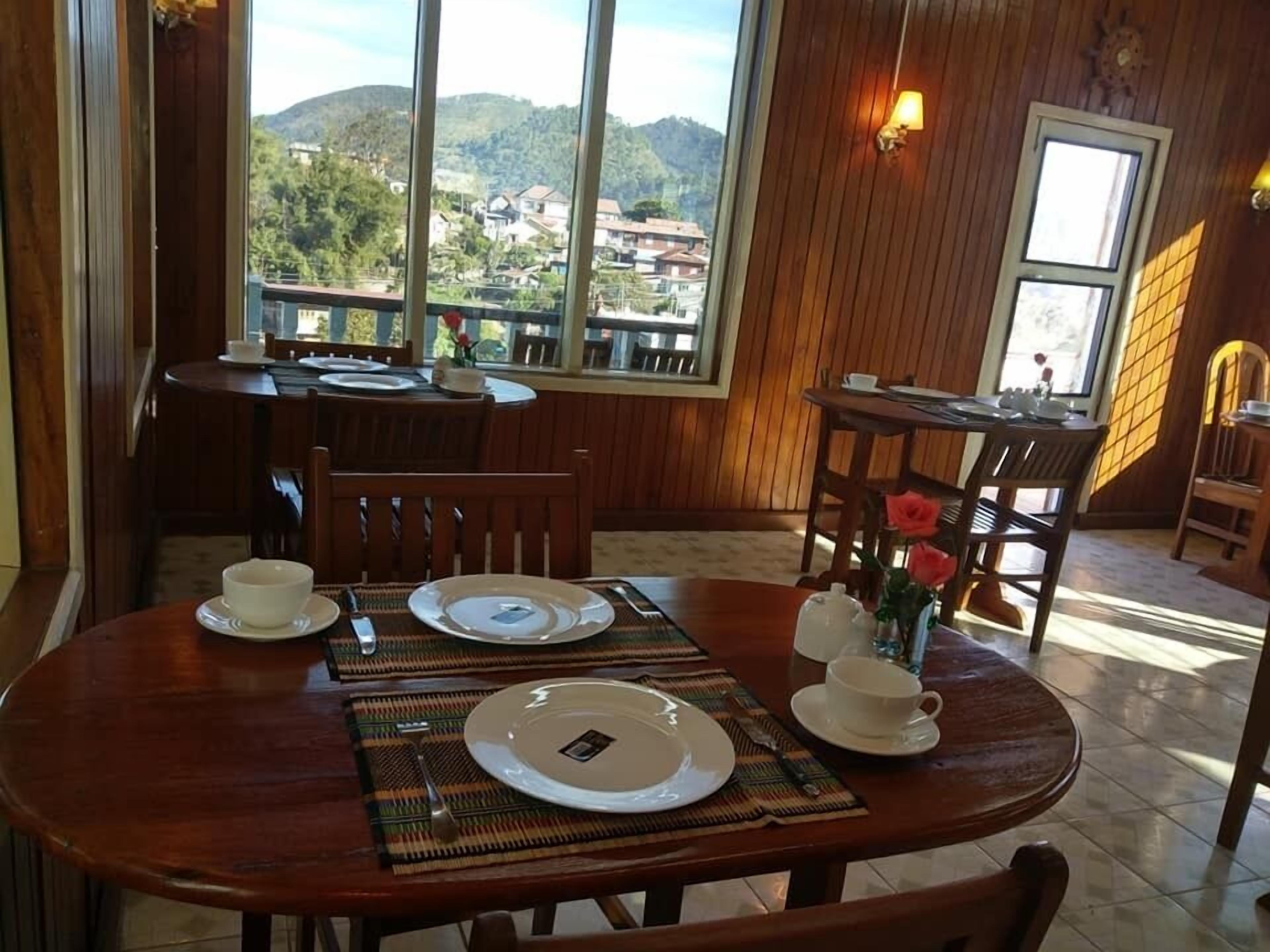 Breakfast, lunch, dinner served; local cuisine 