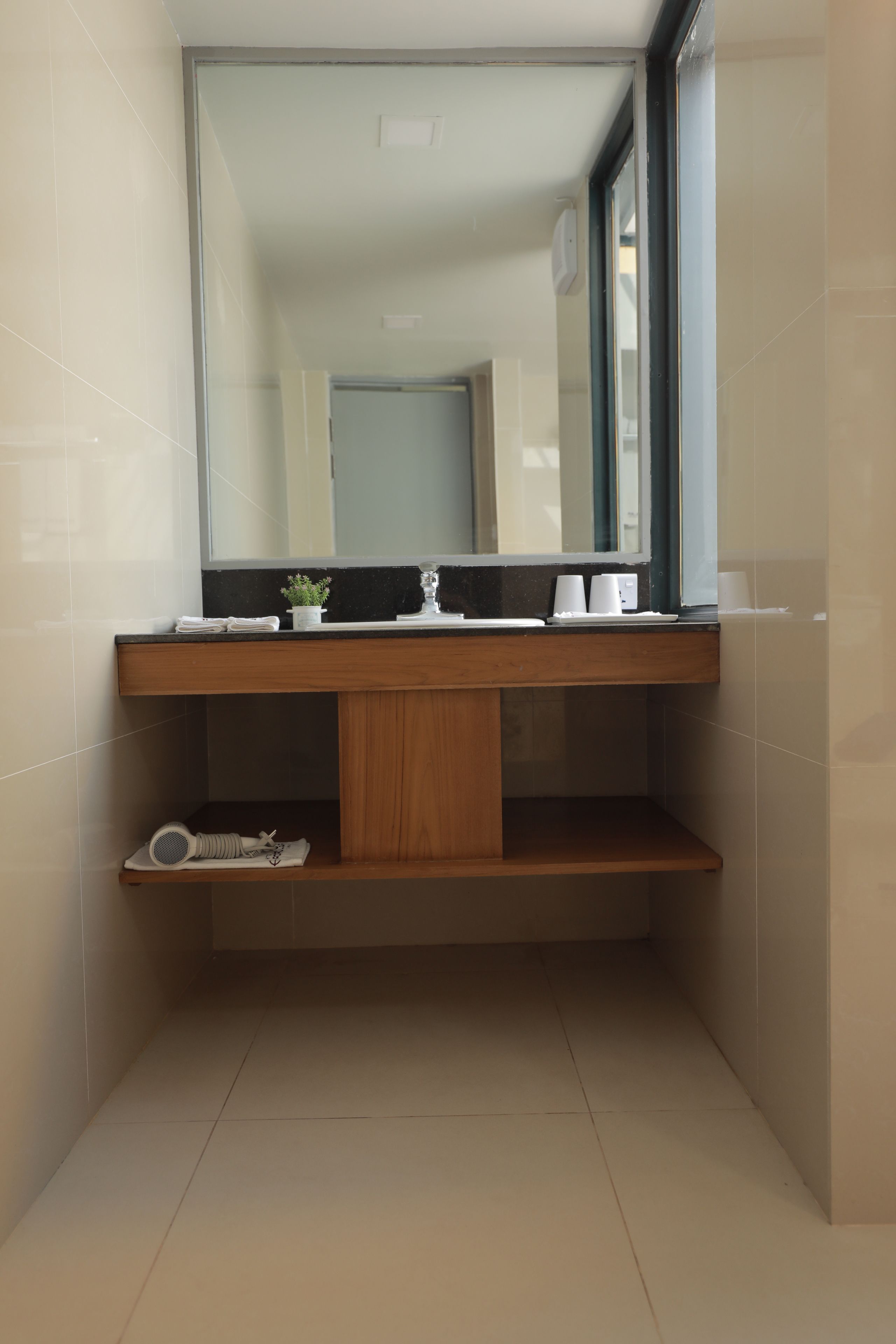 Shower, free toiletries, hair dryer, slippers